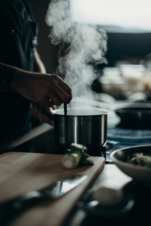 Photo by cottonbro studio: https://www.pexels.com/photo/person-cooking-in-pot-3298605/